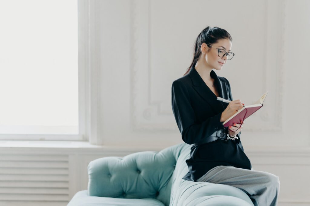 5 Minute presentation topic - Woman sitting on a couch