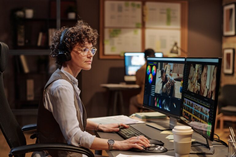 Woman working with multimedia software
