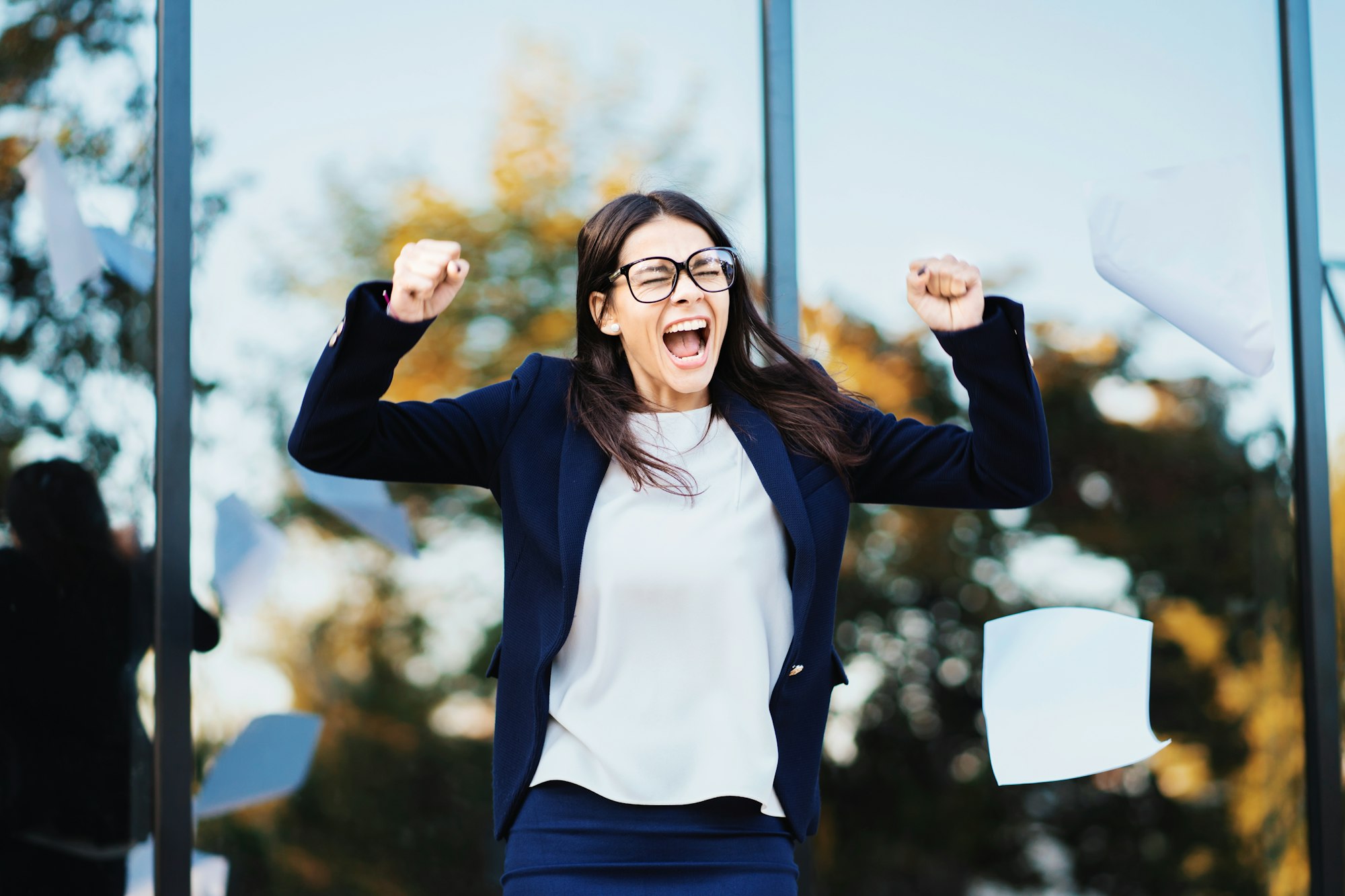 Angry furious female businesswoman screaming in anger.