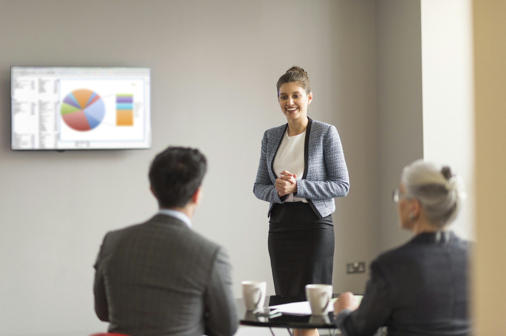 Young businesswoman doing office presentation