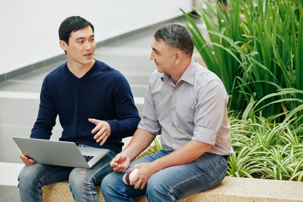 Developer showing presentation to colleague