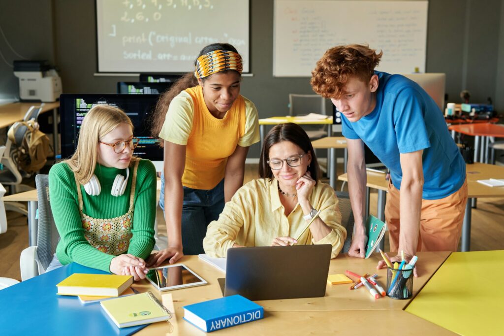 Students Collaborating on Software in Classroom