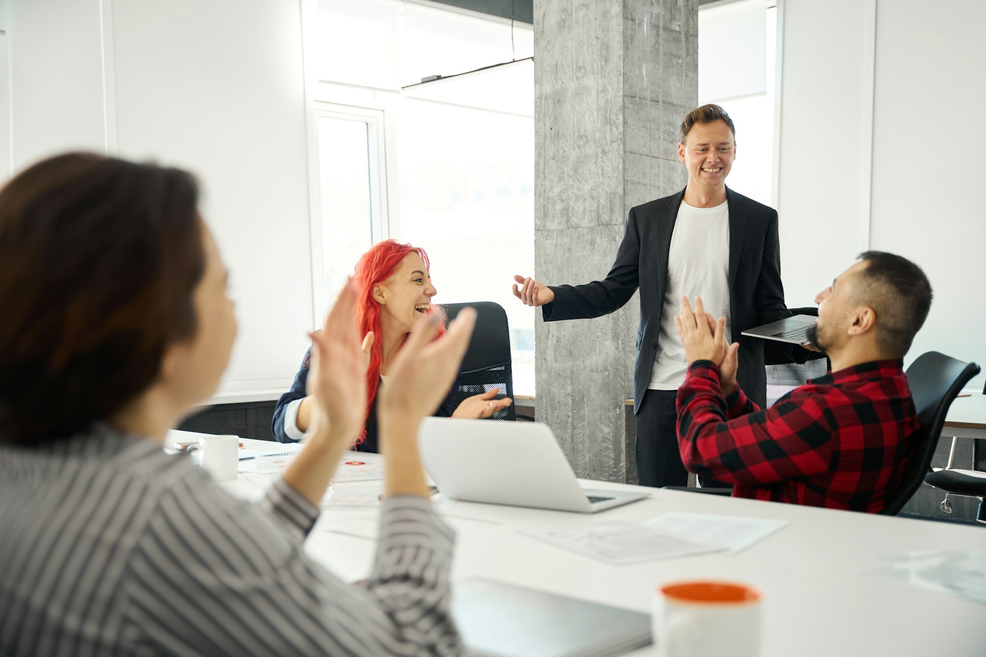 Boss rehearsing speech and presentation in front of employees