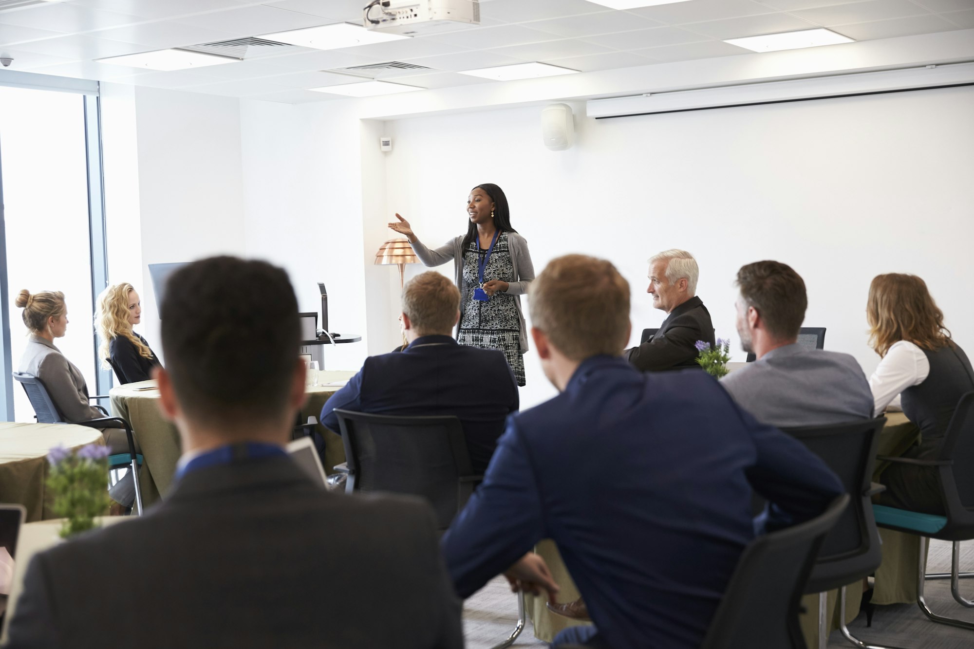 Businesswoman Making Presentation At Conference