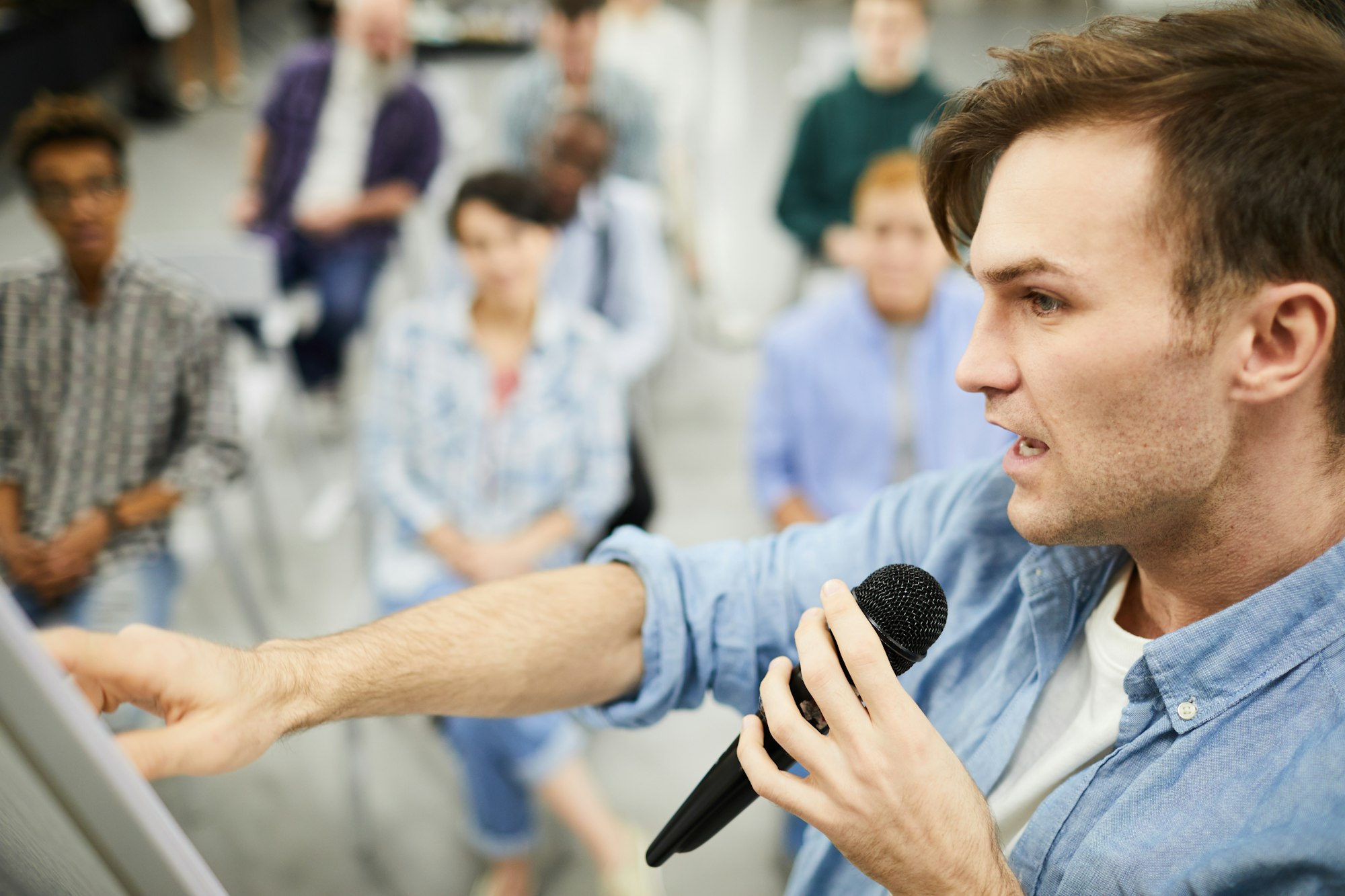 Confident man telling about powerful sales tools