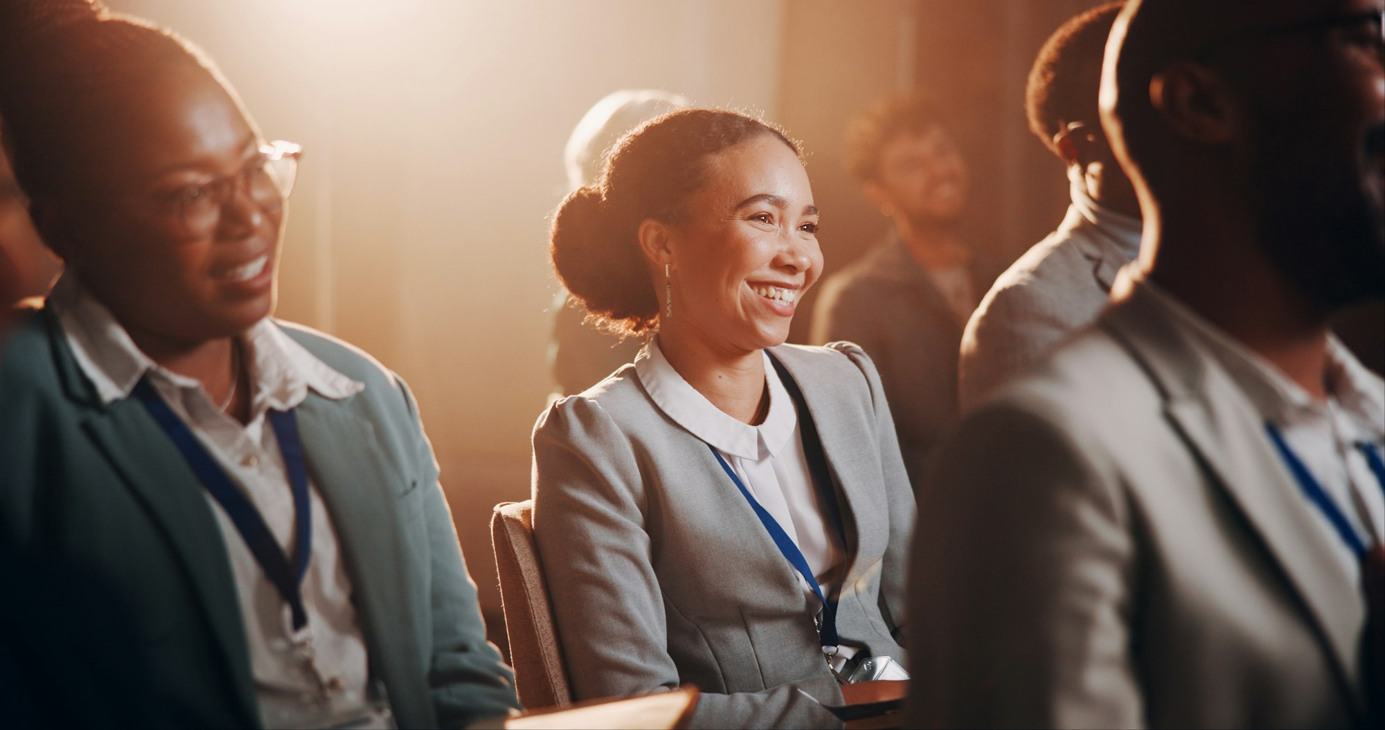 Woman, happy or crowd in presentation for business, employee engagement or positive reinforcement f