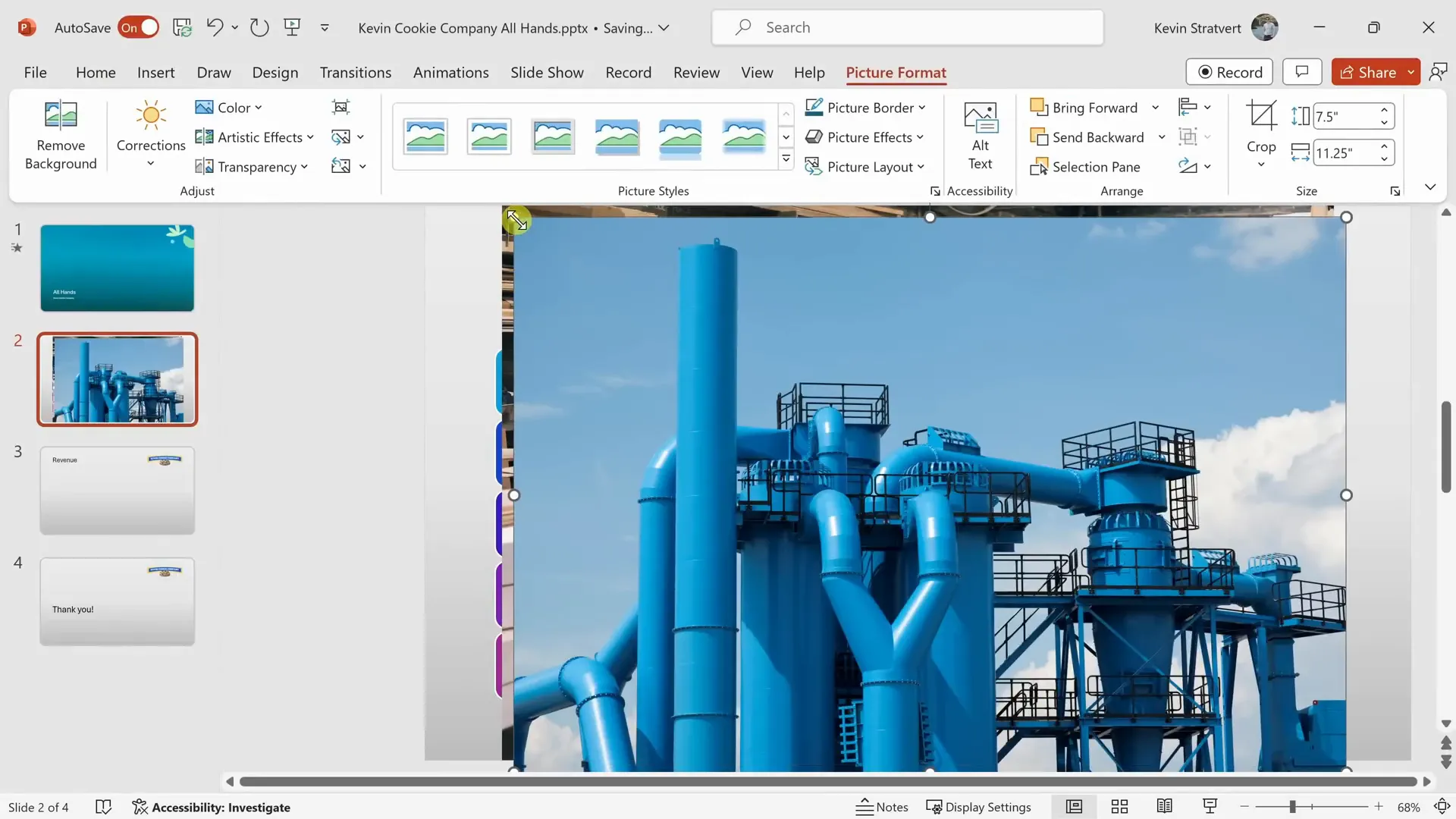 Inserting stock images of a factory into PowerPoint slide