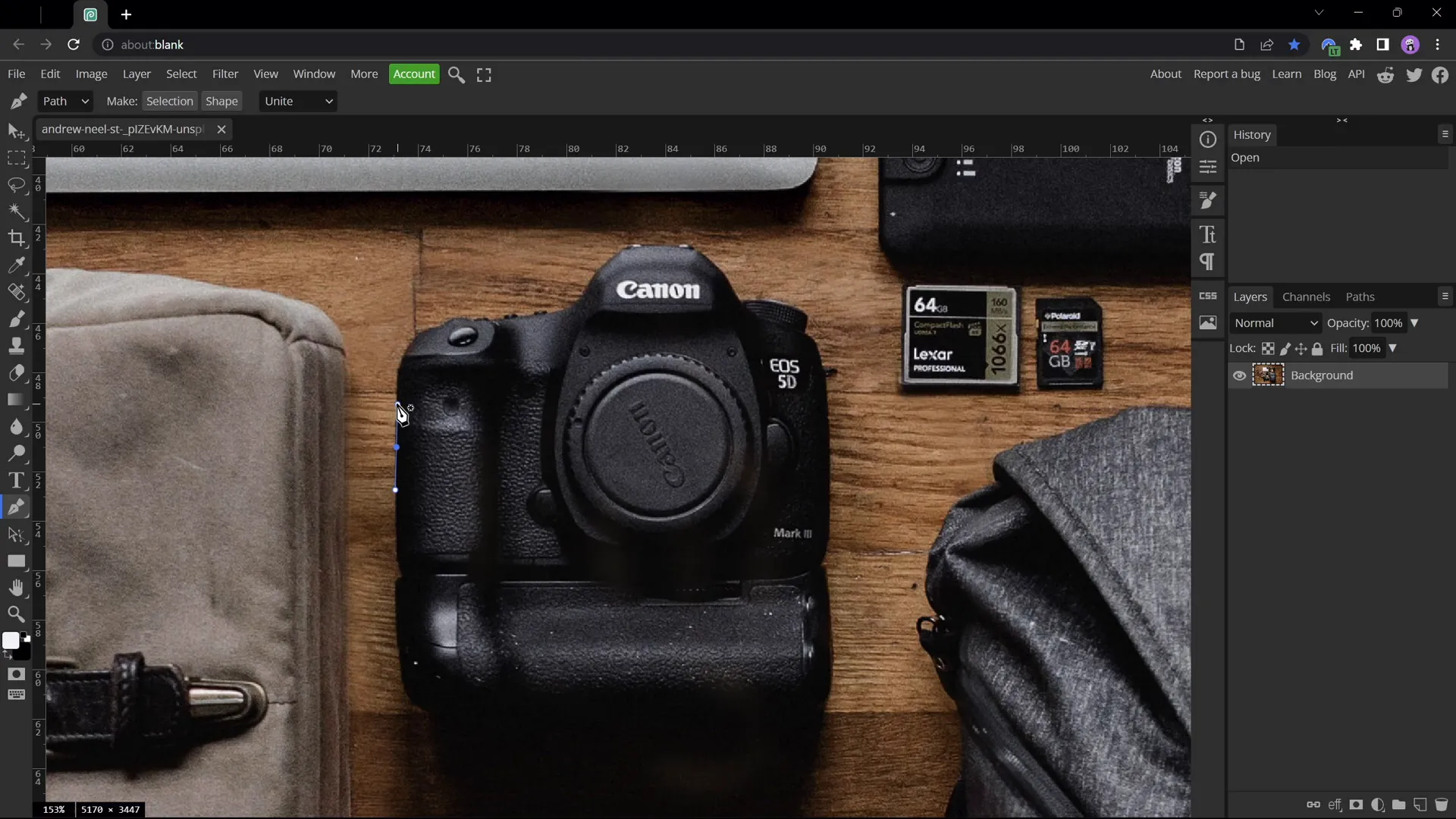 Using pen tool in Photopea to cut out camera object
