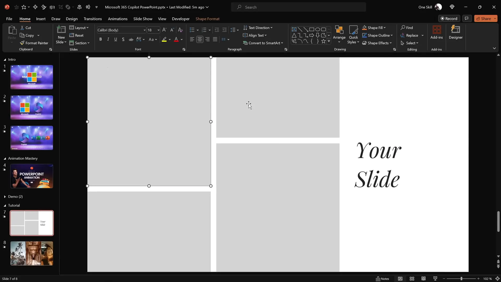 PowerPoint slide with four rectangles and two text boxes arranged