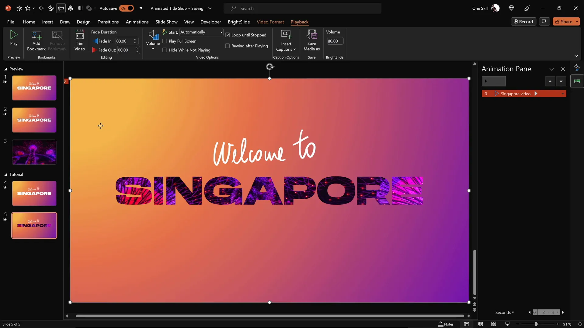 Video placed behind cutout text on slide
